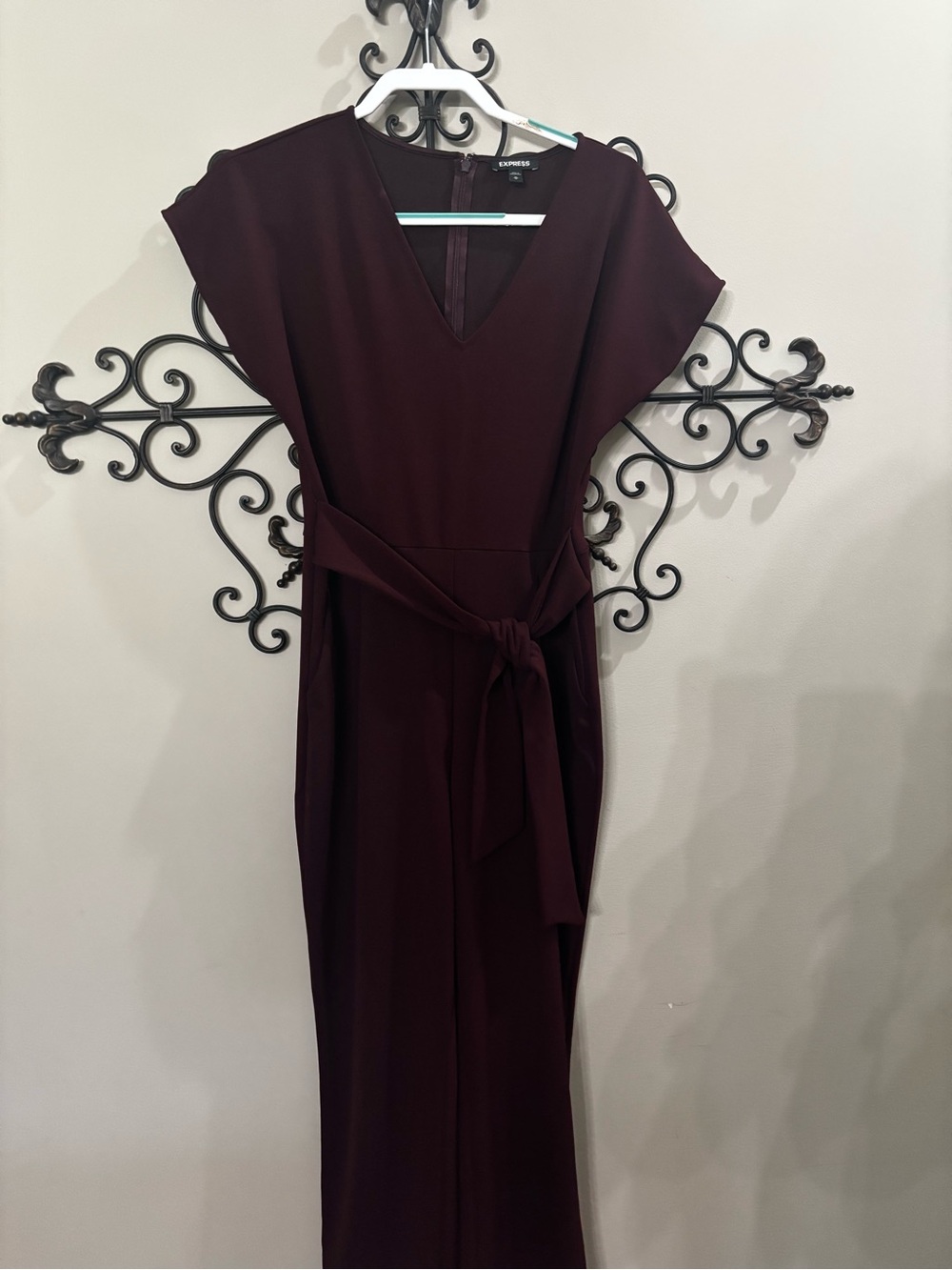 Express jumpsuit size medium.  Color is wine, deep burgundy.